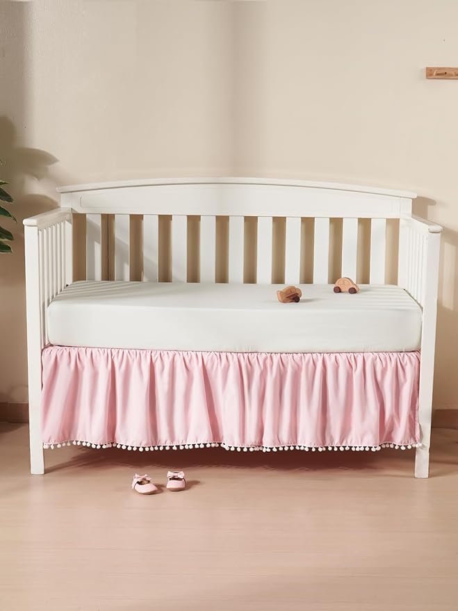 TILLYOU Baby Crib Skirt Girls Boys, Ruffled Bed Skirt with Pompoms, 28”x 52”, 14'' Drop, Pink