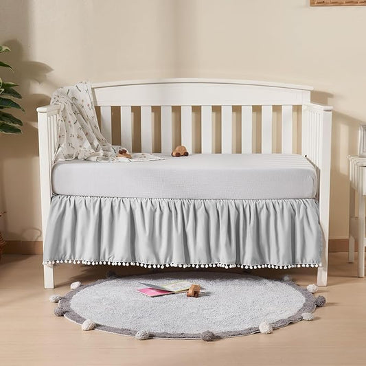 TILLYOU Baby Crib Skirt Girls Boys, Ruffled Bed Skirt with Pompoms, 28”x 52”, 14'' Drop, Gray