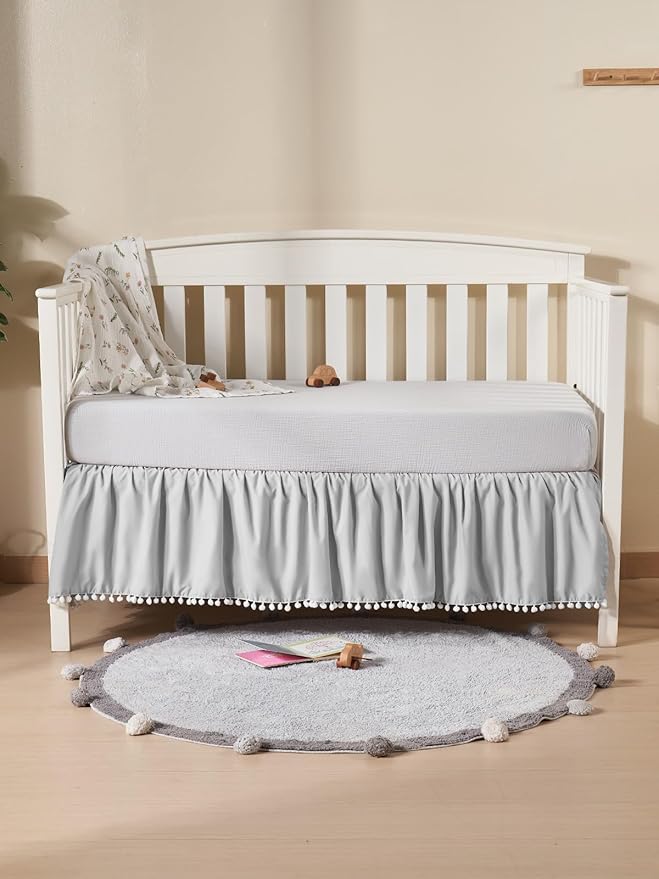 TILLYOU Baby Crib Skirt Girls Boys, Ruffled Bed Skirt with Pompoms, 28”x 52”, 14'' Drop, Gray