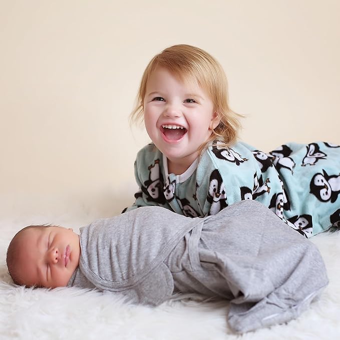 SleepingBaby Zipadee-Zip Transition Swaddle - Cozy Fleece Wearable Blanket with Two-Way Zipper for Baby Sleep - Perfect Penguin, Small (4-8 Month)