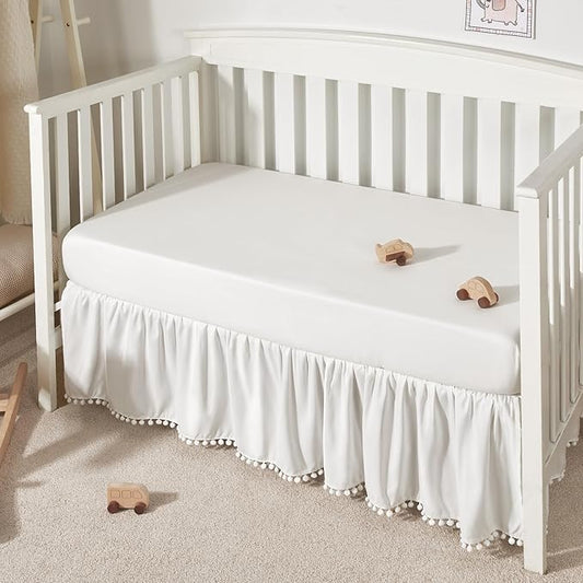 TILLYOU Baby Crib Skirt Girls Boys, Ruffled Bed Skirt with Pompoms, 28”x 52”, 14'' Drop, White